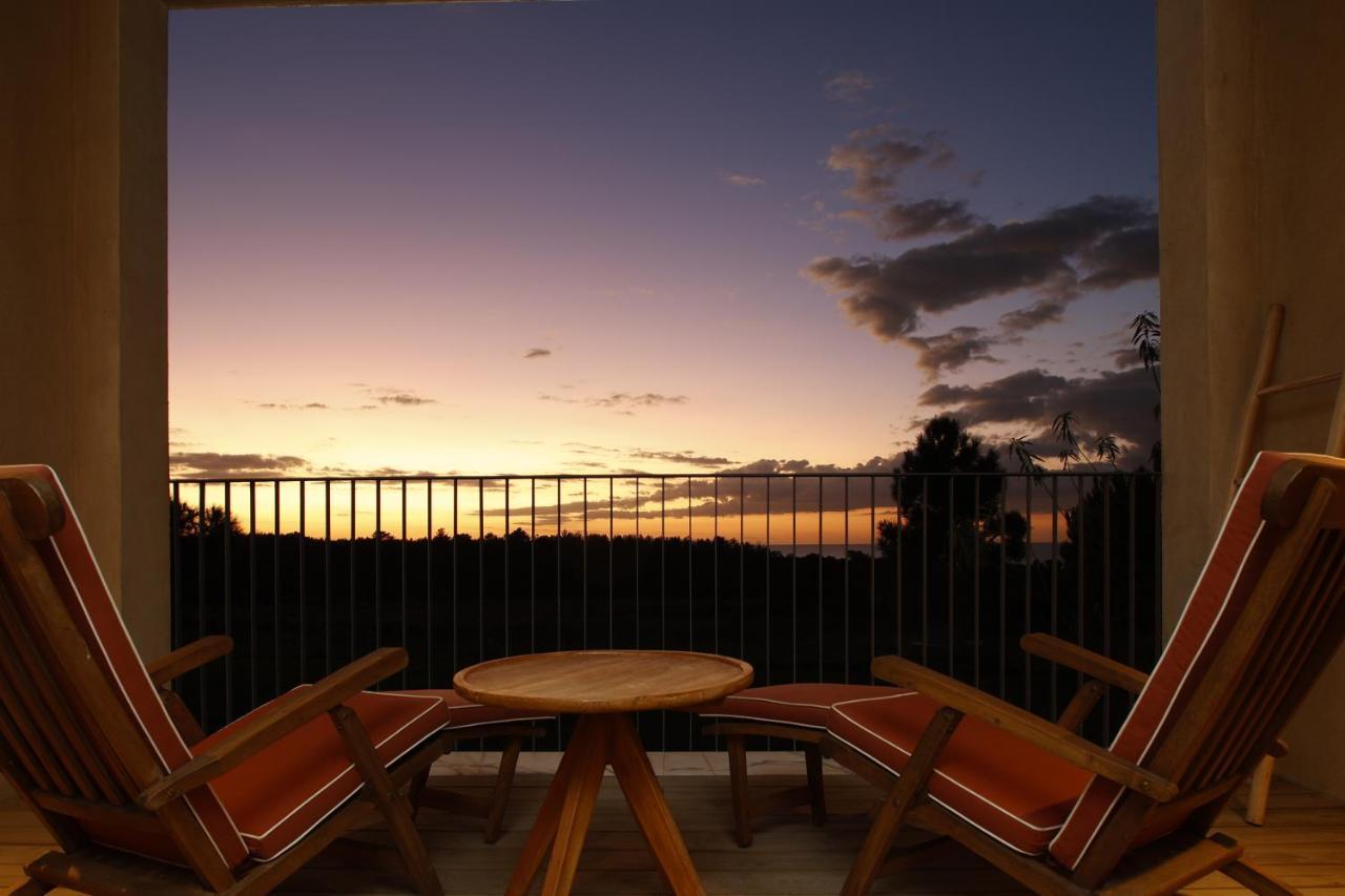 אלג'זור Praia Do Canal Nature Retreat - Small Luxury Hotels Of The World מראה חיצוני תמונה Sunset at the Four Seasons Resort